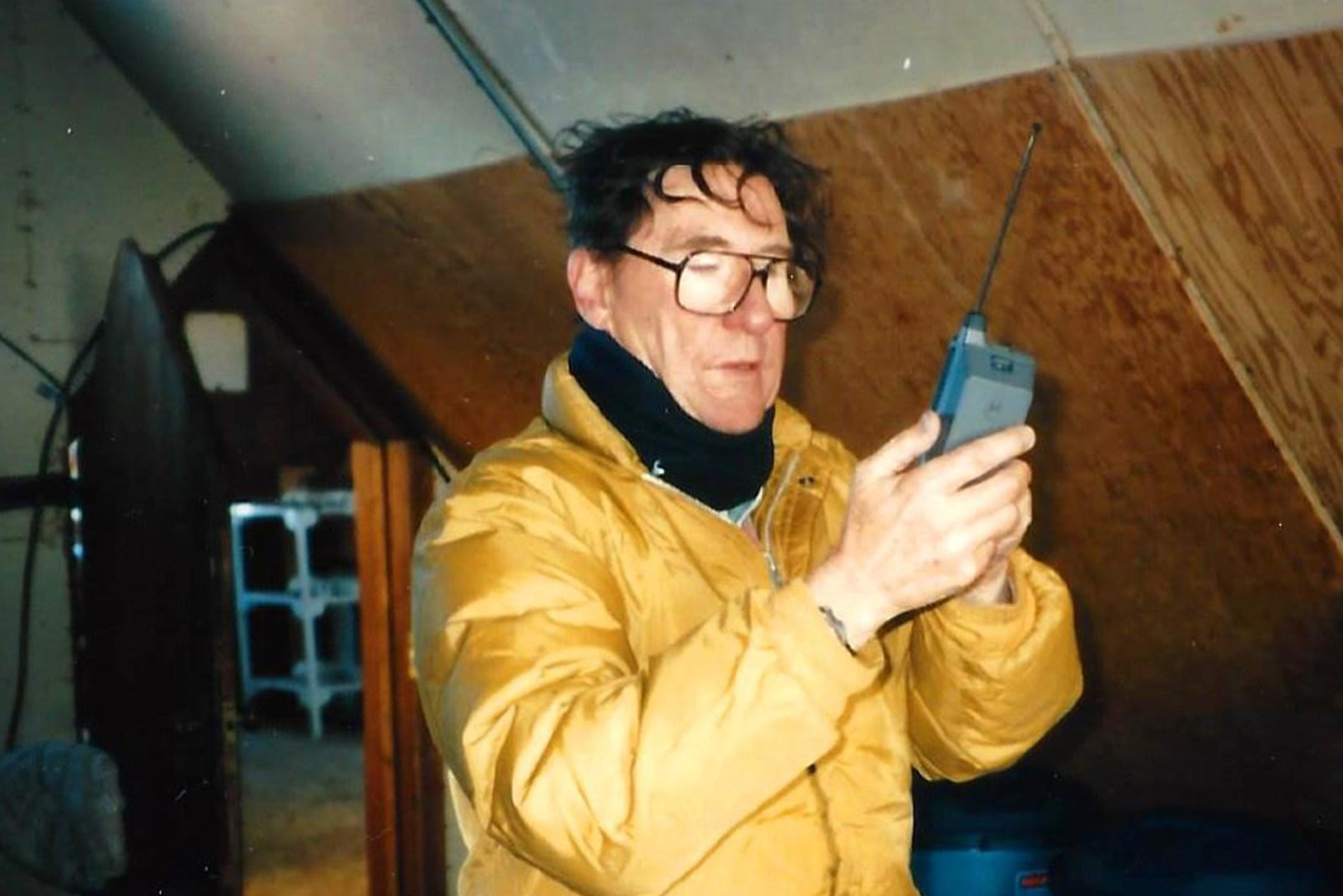 Man with device in cabin