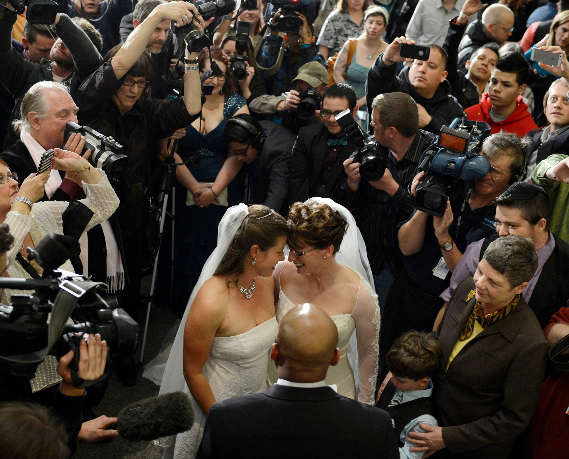 2 women married in a crowd