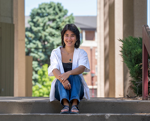 Emmy Radin sits for a photo on the DU campus.