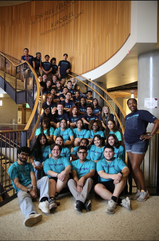 students sitting on stairs