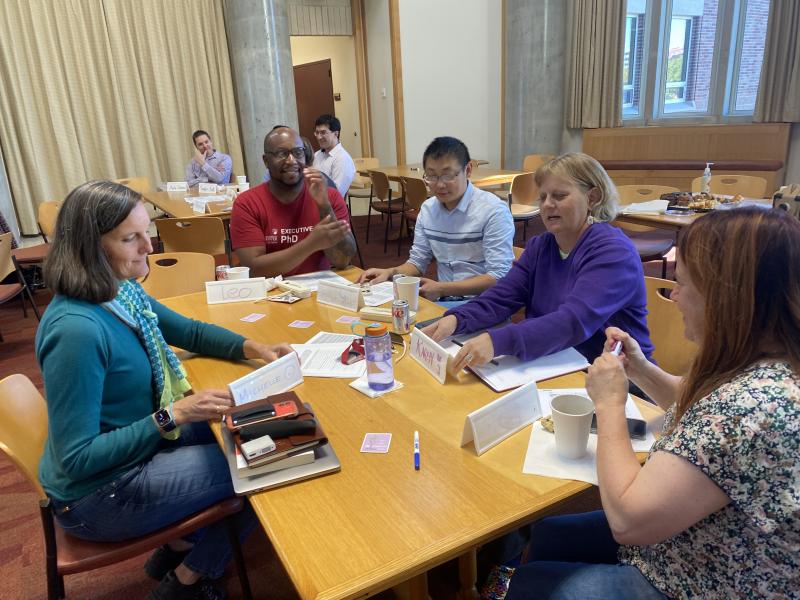 A group works together with Dean Michelle