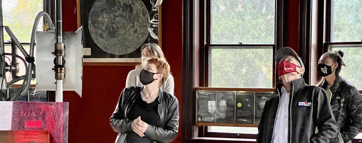 Chancelor Haefner hears from the director of the Chamberlin Observatory.