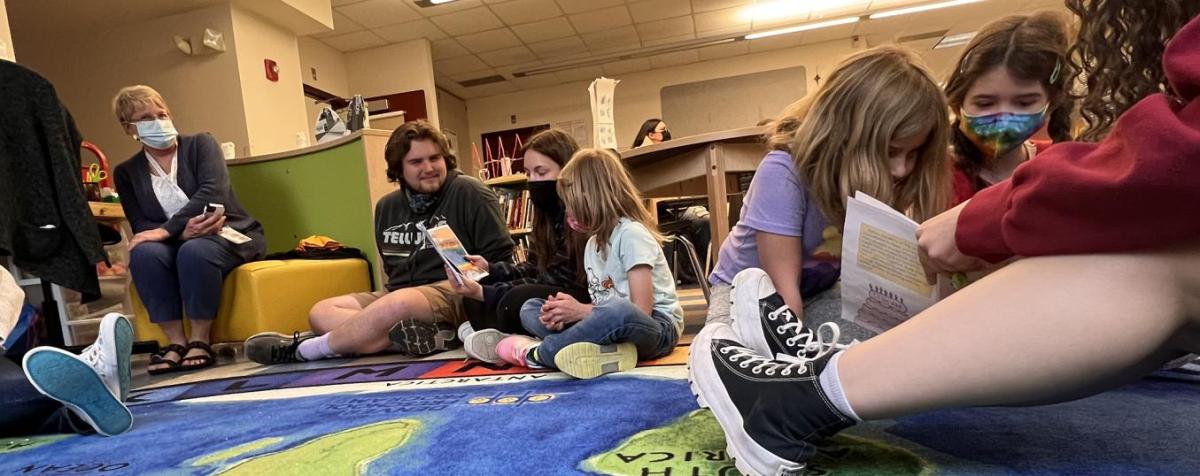 Professor Sasaki and her class engage with students at a local school.