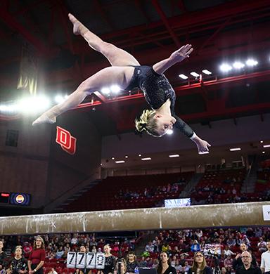 Rylie Mundell competes on the beam.
